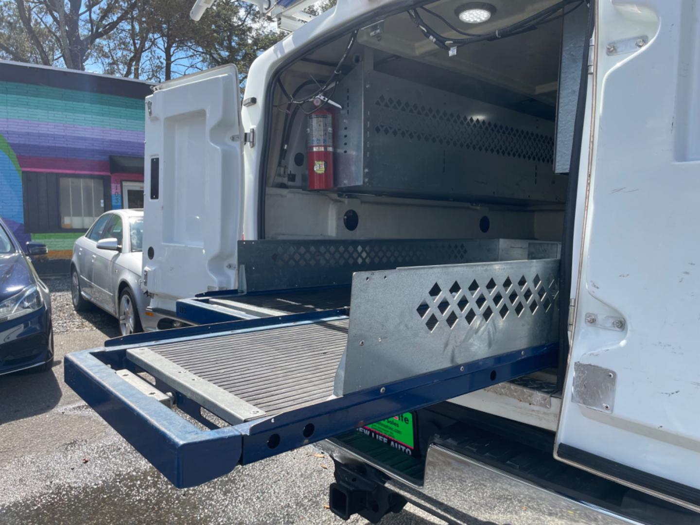 2015 WHITE CHEVROLET SILVERADO 2500H WORK TRUCK (1GC1KUEG7FF) with an 6.0L engine, Automatic transmission, located at 5103 Dorchester Rd., Charleston, SC, 29418-5607, (843) 767-1122, 36.245171, -115.228050 - Local Trade-in with Easy Clean Vinyl Interior, Backup Camera, AM/FM/AUX, Spacious Rear Seat, Power Windows, Power Locks, Power Mirrors, Utility Cab with Storage All Around, Pull Out Bed Storage, Ladder Rack, Safety Strobe Lights, Keyless Entry, Tow Package with Brake Assist, 4-Wheel Drive, Brush Gua - Photo#15